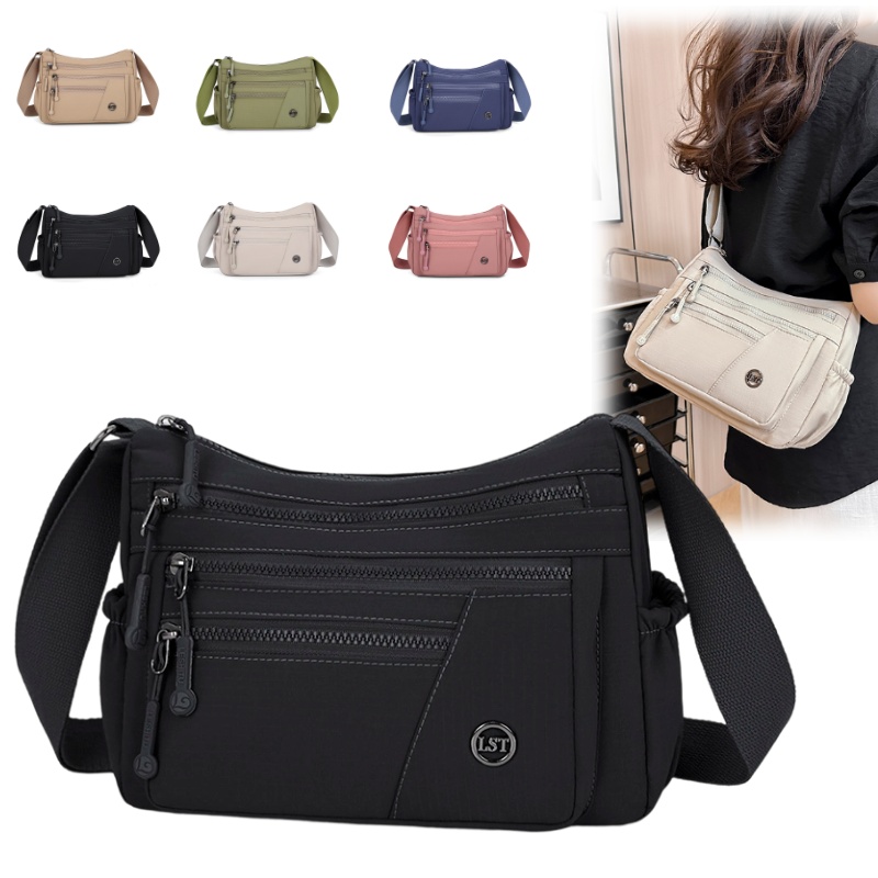Travel Backpack Anti Theft - กระเป๋าสะพายข้างไนลอนสำหรับผู้หญิง ป้องกันการโจรกรรม มีช่องจัดเก็บอย่างเป็นระเบียบ น้ำหนักเบา กันน้ำ ผ้าอ๊อกซ์ฟอร์ด
