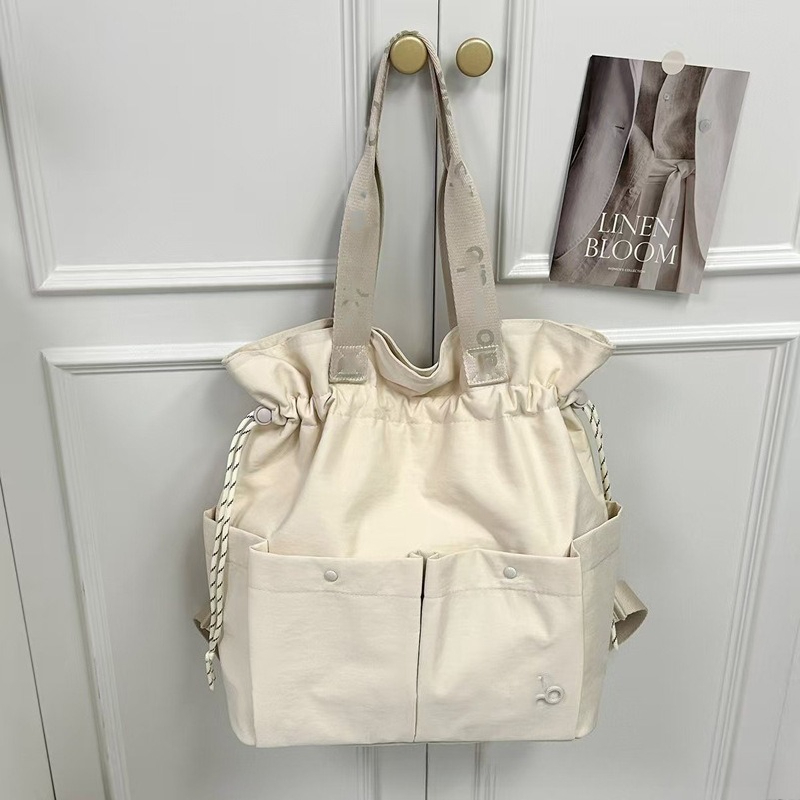 กระเป๋าถือใต้วงแขนแบบมีเชือกรู - Drawstring Gym Bag บทวิจารณ์และราคา